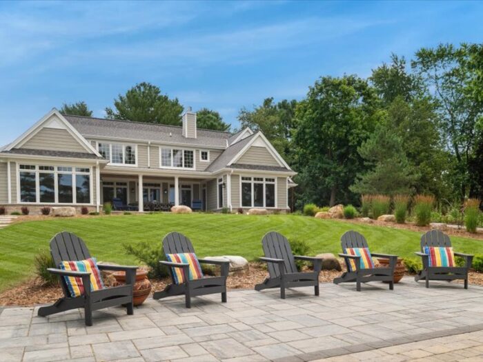 Van's Lumber custom built homes in Northeast Wisconsin exterior back and stone patio