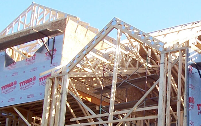 The wood framing of a custom built home